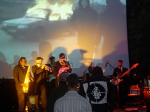 Featured Musical Guests-  Blitz the Ambassador with The Embassy Ensemble. Blurry shot. Good music.